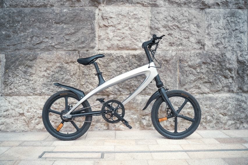 white cruzaa ebike outdoors leaning white cruzaa ebike outdoors leaning