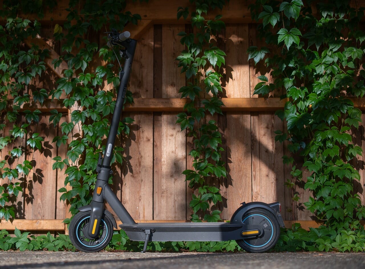 A vibrant image showcasing a person effortlessly gliding on a Segway or balance board along a scenic coastal path, capturing the perfect balance and control, with the wind gently tousling their hair